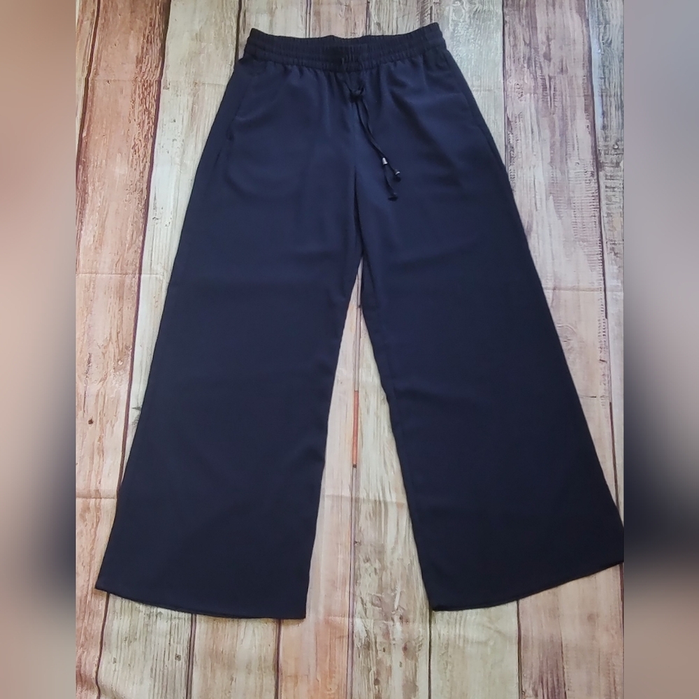 Palazzo H M   size 12 color  navy  blue  elastic waist Pockets Good Condition